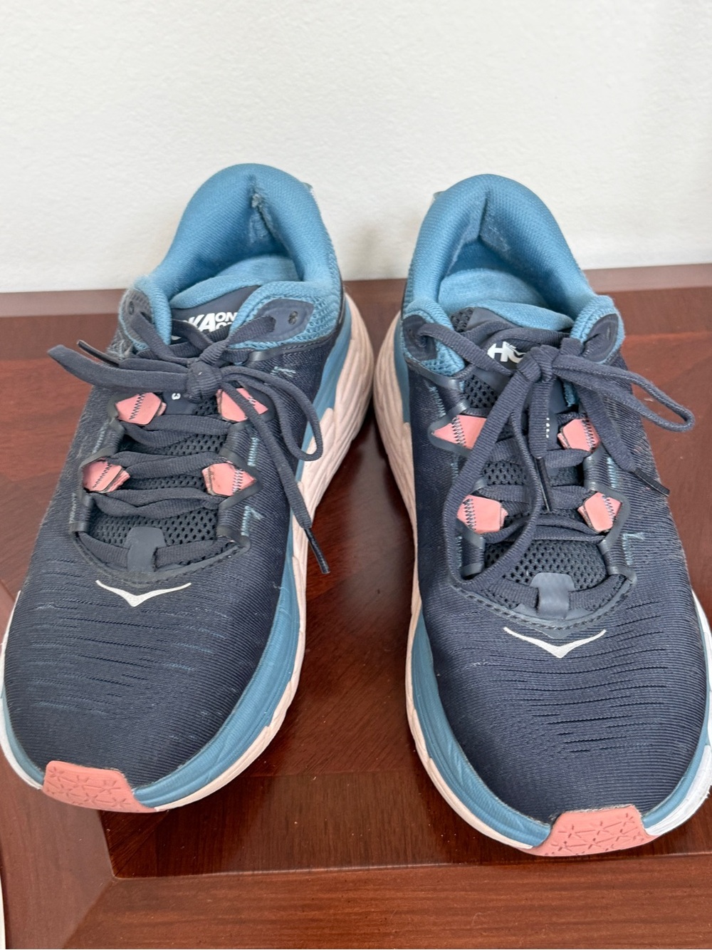 Hoka Women's Navy Athletic Running Shoes with Pink Accents. 
Gaviota 3. Size 8.5